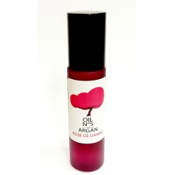 oragnic argan oil infused with rosa damascena. rechargeable pink glass roller bottle