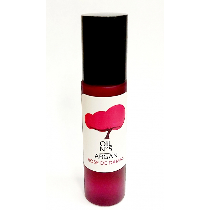 oragnic argan oil infused with rosa damascena. rechargeable pink glass roller bottle