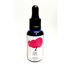 Organic argan oil infused with rosa damascena.  Dark glass blue bottle. 30ml with pipette