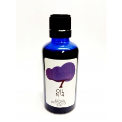 Huile d'argan bio premium infusion huiles essentielles de patchouli. 100% bio. bouteille en verre bleu foncé