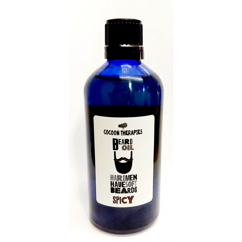 Organic Extra Virgin Argan Oil, Premium quality, infused with a spicy mix of essential oils.  100ml blue glass bottle