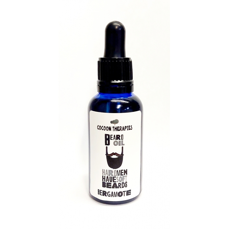 beard oil. Organic argan oil infrused with bergamote essential oil. 30ml blue glass bottle with pipette