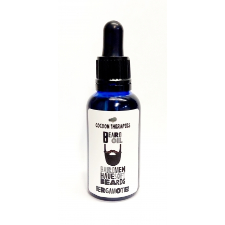 beard oil. Organic argan oil infrused with bergamote essential oil. 30ml blue glass bottle with pipette
